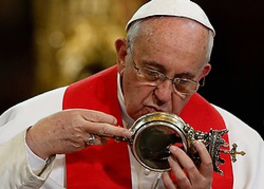 Pope kisses reliquary
